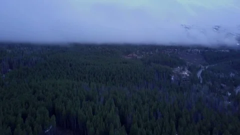 Flying into Clouds in Rocky Mountains Video stock 82919938