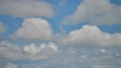 Flying clouds on a sunny day Stock Footage 258099724