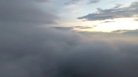 Flying with the clouds at sunrise. Stock Footage 81135438