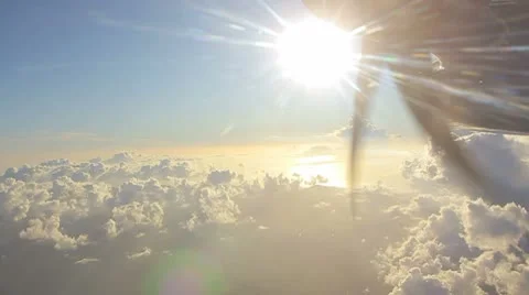 Flying into the clouds in sunset Stock Footage 8945171