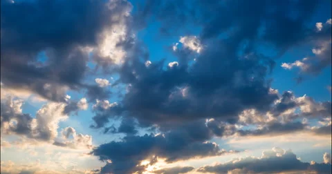 Flying clouds at sunset Stock Footage 68947995