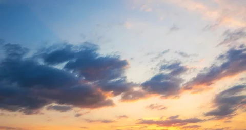 Flying clouds at sunset Stock Footage 92576333