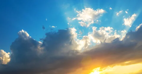 Flying clouds at sunset Stock Footage 138444984