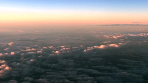 Flying on the clouds at sunset Vídeos de archivo 149899634