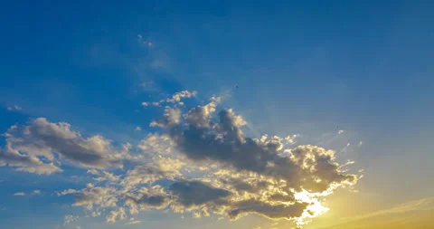 Flying clouds at sunset Stock Footage 154742783