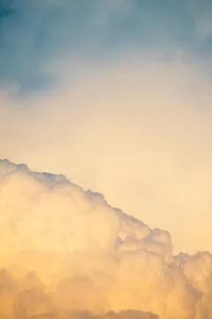 Flying in the clouds at sunset Stock Photos