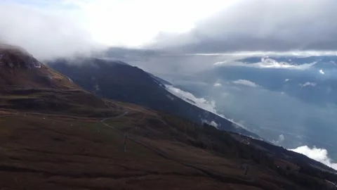 Flying in the clouds. Swiss Aples Stock Footage 228840645