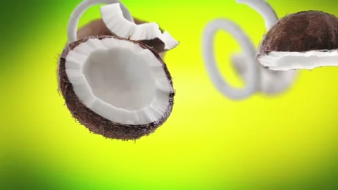 Flying Coconut and Coconuts slices in Lime Green Background Video stock 229561346