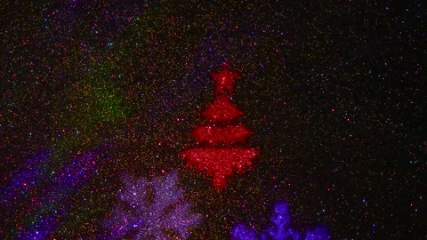 Flying colored silhouettes of Christmas trees and snowflakes. Stock-Footage 202040069