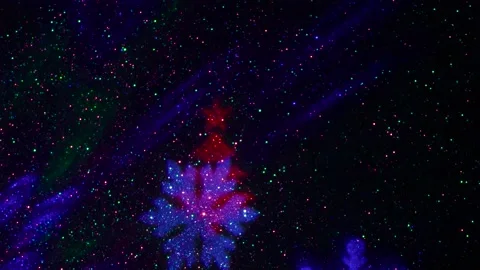 Flying colored silhouettes of Christmas trees and snowflakes. Stock-Footage 202040269