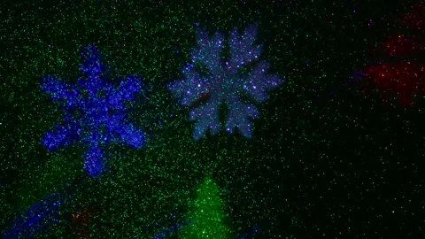 Flying colored silhouettes of Christmas trees and snowflakes. Stock-Footage 202040332