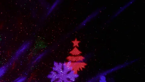 Flying colored silhouettes of Christmas trees and snowflakes. Stock-Footage 202040922