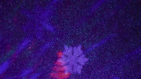 Flying colored silhouettes of Christmas trees and snowflakes. Stock-Footage 202041011