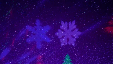 Flying colored silhouettes of Christmas trees and snowflakes. Stock-Footage 202041105