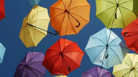 Flying colored umbrellas Vídeo Stock 89191896