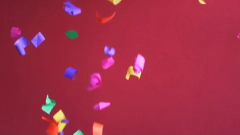 Flying confetti in 120fps on red background Stock-Footage 104039913