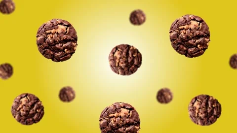 Flying Cookies for breakfast of different diameters in 4K UHD footage. Stock Footage 166412549