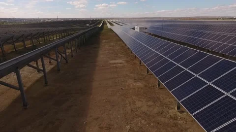 Flying on a copter between solar panels environmentally friendly energy Stock Footage 68211124