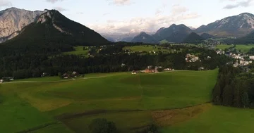 Flying copter over the charming rural village in the green mountains. 4k, Alps. Stock Footage 85895745