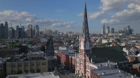 Flying counter clockwise around iconic church in Greenpoint Brooklyn Video stock 250159223