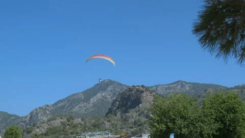 Flying in a couple across beach. Stock Footage 231729319
