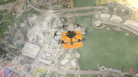 Flying delivery drone transporting cardboard box Stock-Footage 160050168