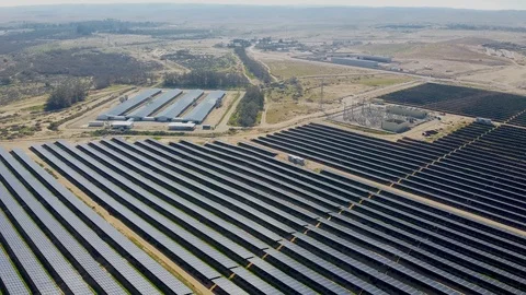 Flying to direction of sun over solar panels Stock-Footage 125709425