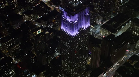 Flying directly over the Empire State Building at night. Shot in 2011. Stock Footage 59172379
