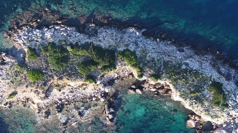 Flying directly over small Mediterranean Island with INSPIRE 2 drone Stock Footage 101428903