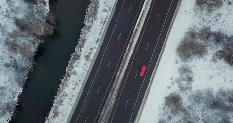 Flying DJI Mavic Pro through Ogden, Utah winter canyons along side traffic. Stock Footage 106434816