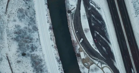 Flying DJI Mavic Pro through Ogden, Utah winter canyons along side traffic. Stock Footage 106434821