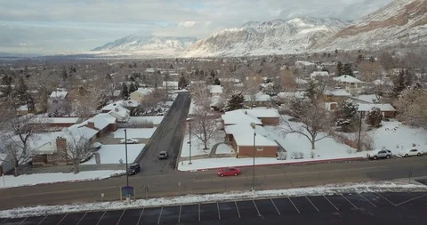 Flying DJI Mavic Pro through Ogden, Utah winter canyons along side traffic. Stock Footage 106510456