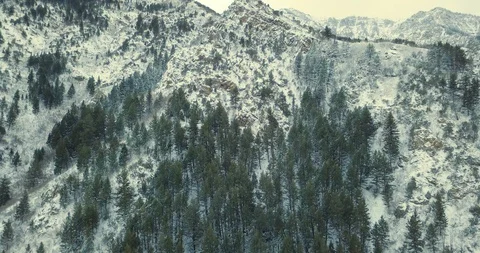 Flying DJI Mavic Pro through Ogden, Utah winter canyons along side traffic. Stock Footage 106510690