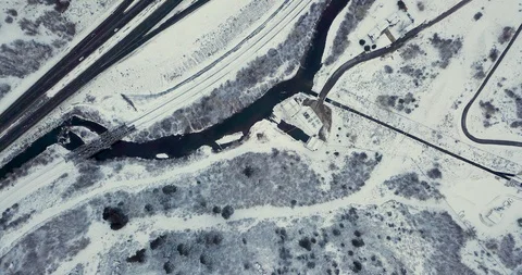 Flying DJI Mavic Pro through Ogden, Utah winter canyons along side traffic. Stock Footage 106542485