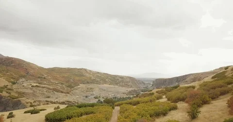 Flying DJI Mavic Pro through Ogden, Utah canyons in the summer. Stock Footage 106542748