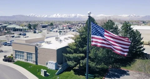 Flying DJI Mavic Pro in Utah, with USA Flag Stock Footage 106645805