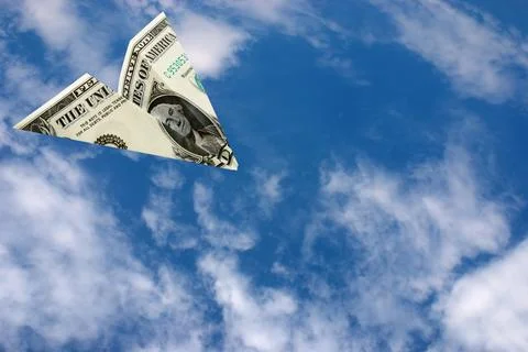 Flying dollar Stock Photos