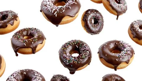 Flying Donuts On White Background Stock Photos