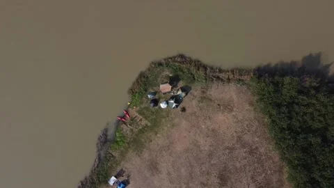 Flying down and rotate towards group of campers, Thailand Stockbeeldmateriaal 148847261