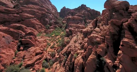 Flying down into and through Red Rock Canyon, Nevada Stock Footage 73529036
