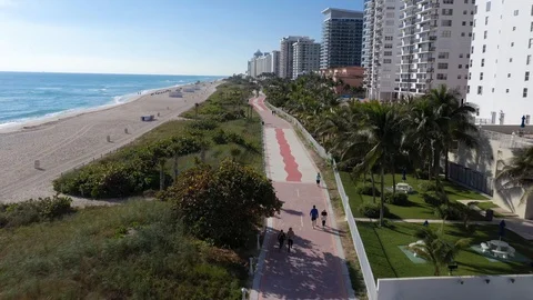 Flying Down the Boardwalk on Miami Beach Stock Footage 112839825