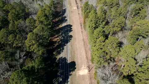 Flying Down A Forrested Country Road Stock Footage 299928221