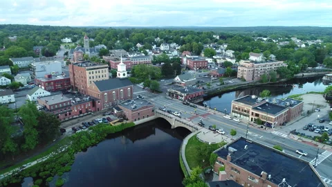 Flying down Nashua River Next to Downtown Nashua Video stock 244602868
