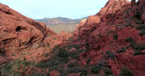 Flying down into Red Rock Canyon's Calico I  west of Las Vegas, Nevada Stock Footage 72969671