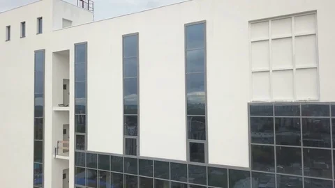 Flying down the skyscraper's facade Stock Footage