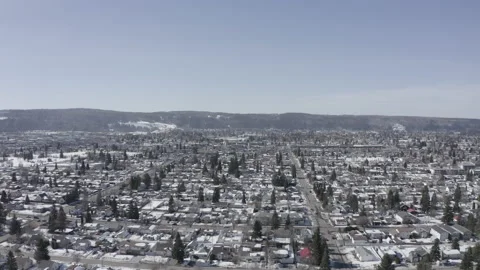 Flying down toward the ground.  winter town sunny day Stock Footage 146004713