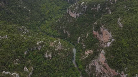 Flying down towards river in zagori part 1 Stock Footage 220372091