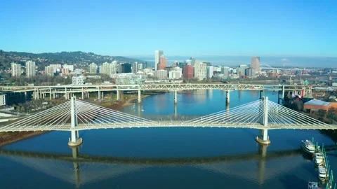 Flying down the Willamette River towards the Tilikum Crossing Bridge Stock Footage 147357861