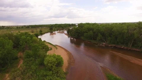 Flying Downstream and Lifting Up Color Corrected Stock Footage 98846053