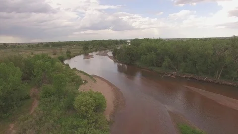 Flying Downstream and Lifting Up Stock Footage 98846081